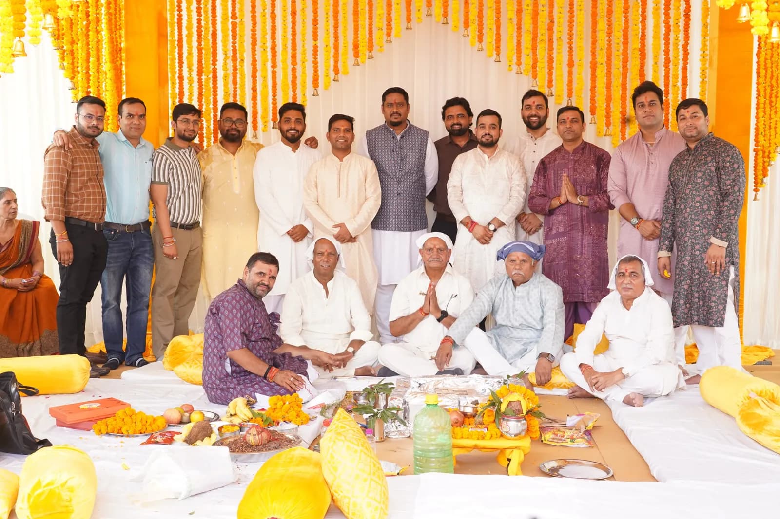 Maxvolt Energy team and priests gathered under a marigold-decorated canopy for the Bhoomi Pujan of the 10 GWh lithium battery plant in Aligarh, Uttar Pradesh